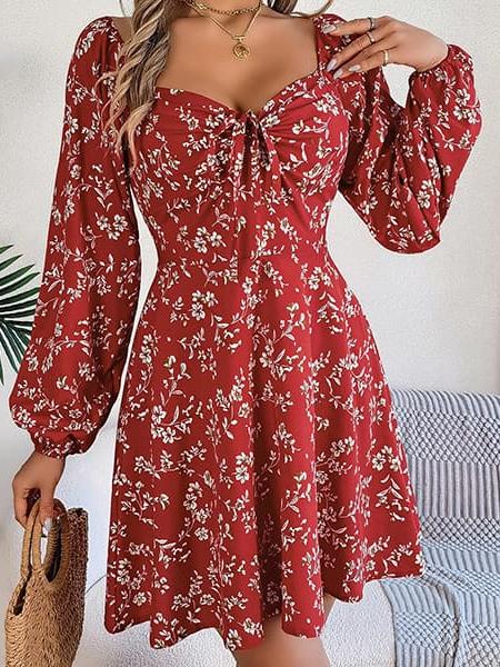 Robe cocktail fleurie mi longue