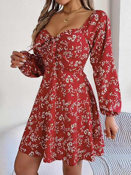 Robe cocktail fleurie mi longue