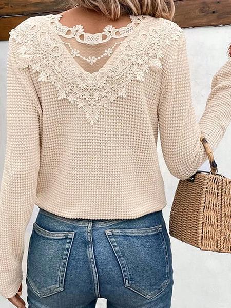 pull fleuri dos ouvert