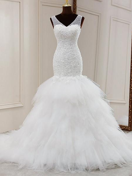 Robe de mariée fleurie volants