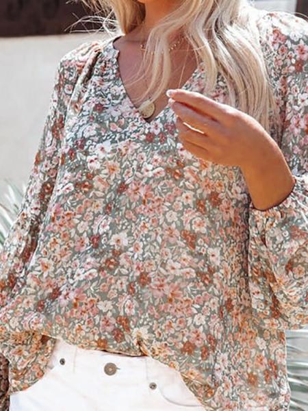 Blouse fleurie manches bouffantes